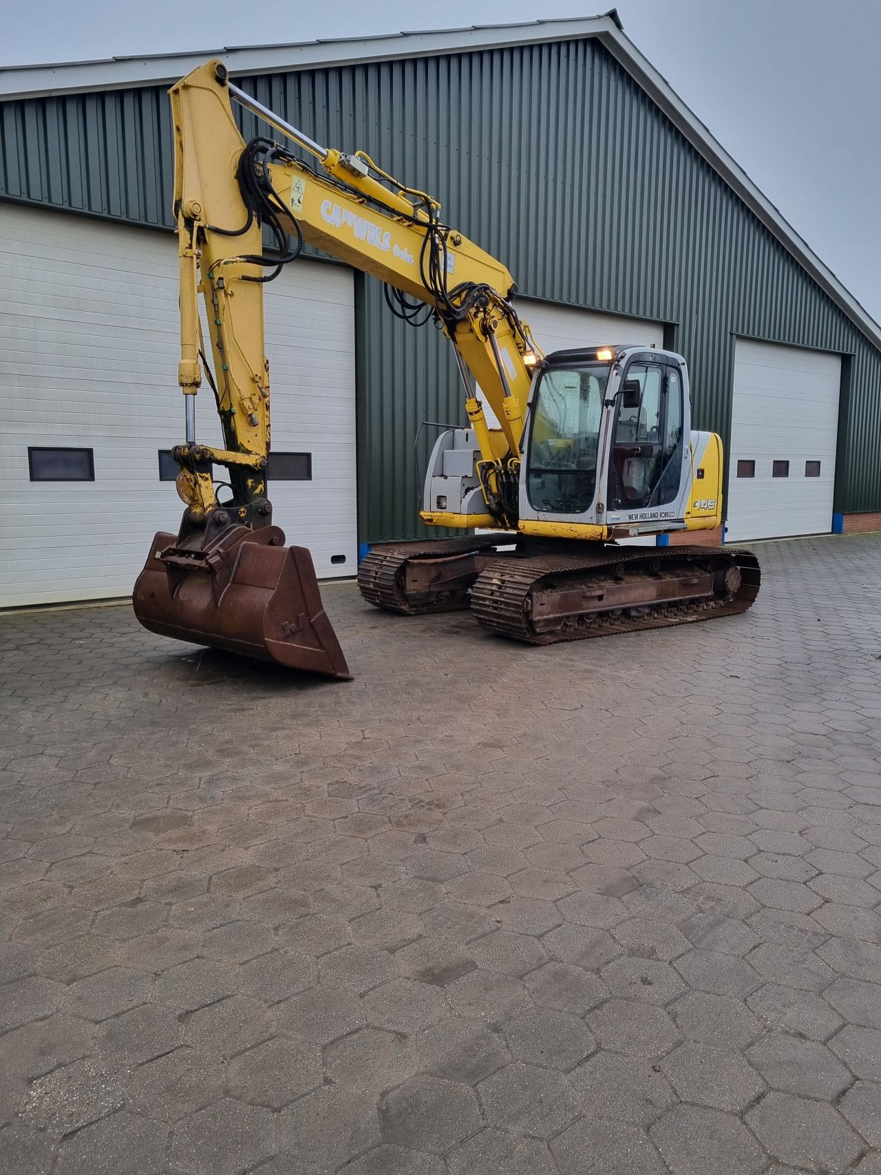 New Holland/Kobelco E145 rupskraan/graafmachine 2008
