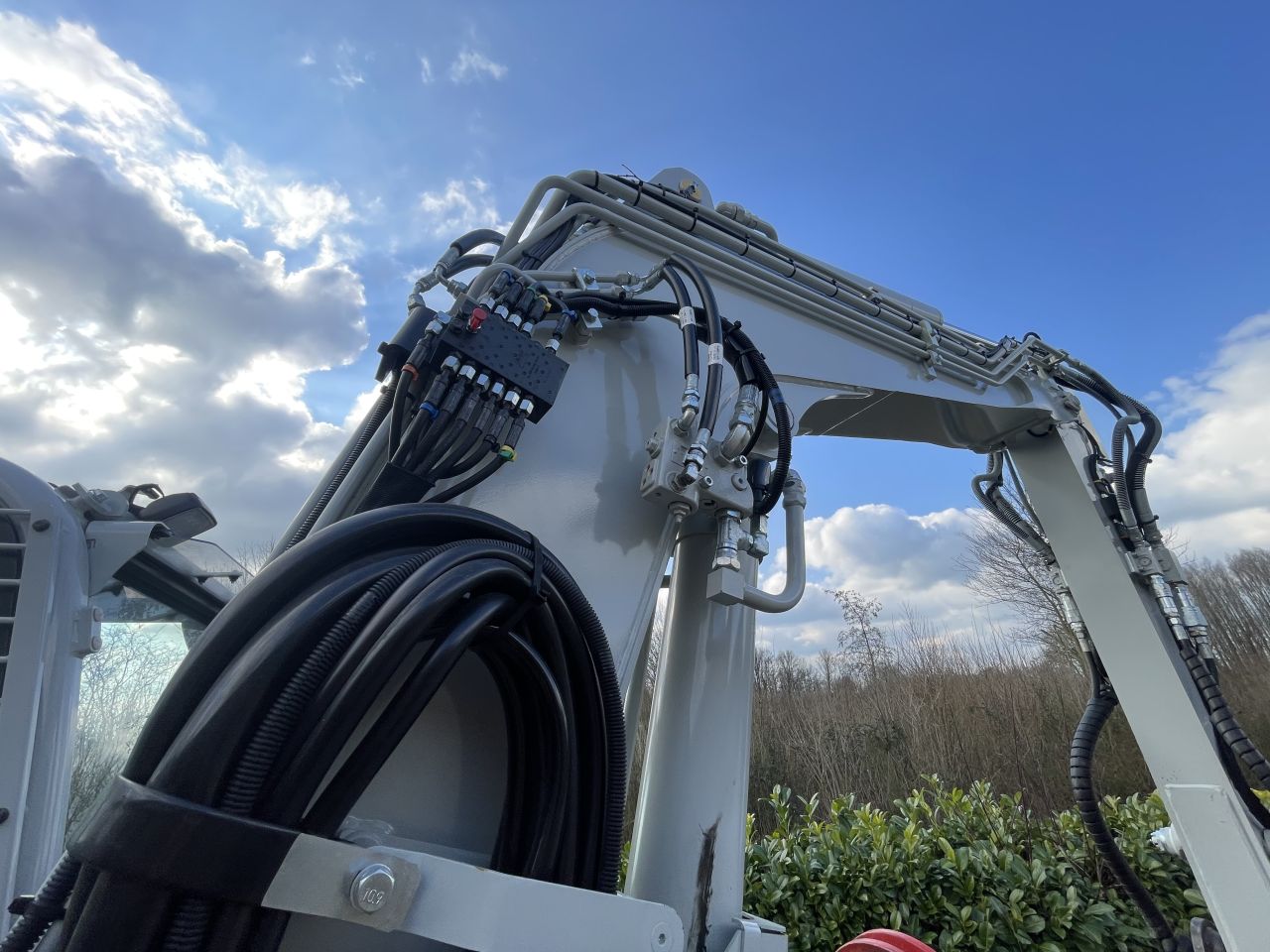 Takeuchi TB257FR met RototiltR2 gripper en autosmering 2023