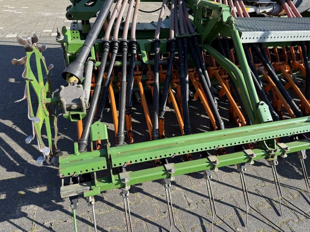 Amazone KE 403 rotorkopeg met zaaimachine