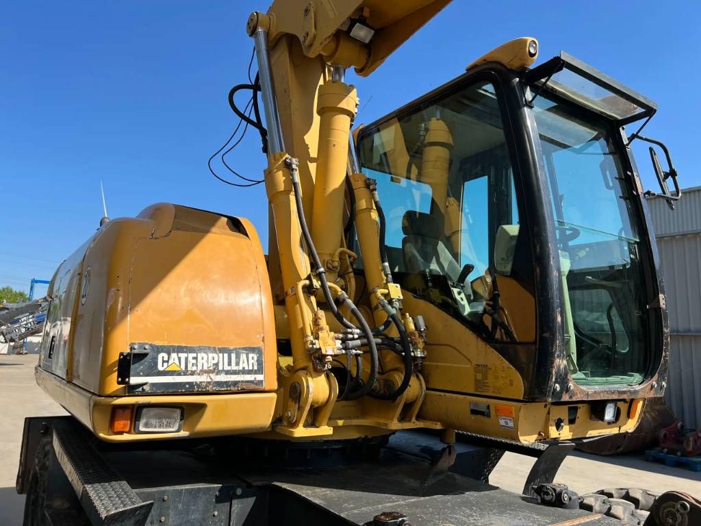 CAT M316C