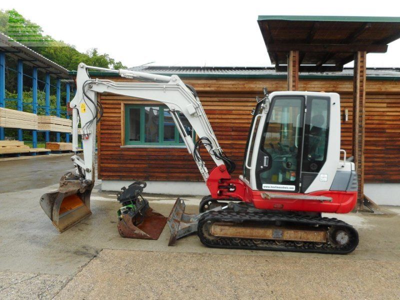 Takeuchi tb 250 ( 4.965kg ) hydr. sw + 2 löffel + alle le