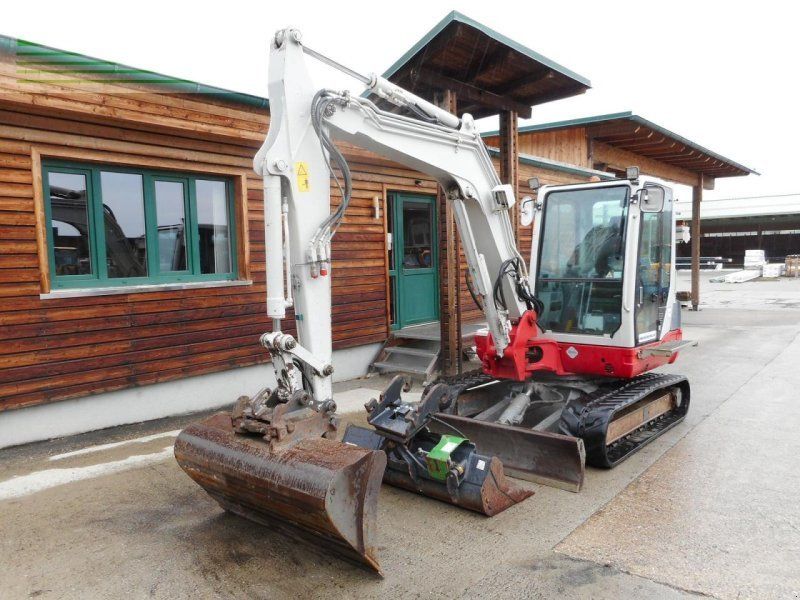 Takeuchi tb 250 ( 4.965kg ) hydr. sw + 2 löffel + alle le