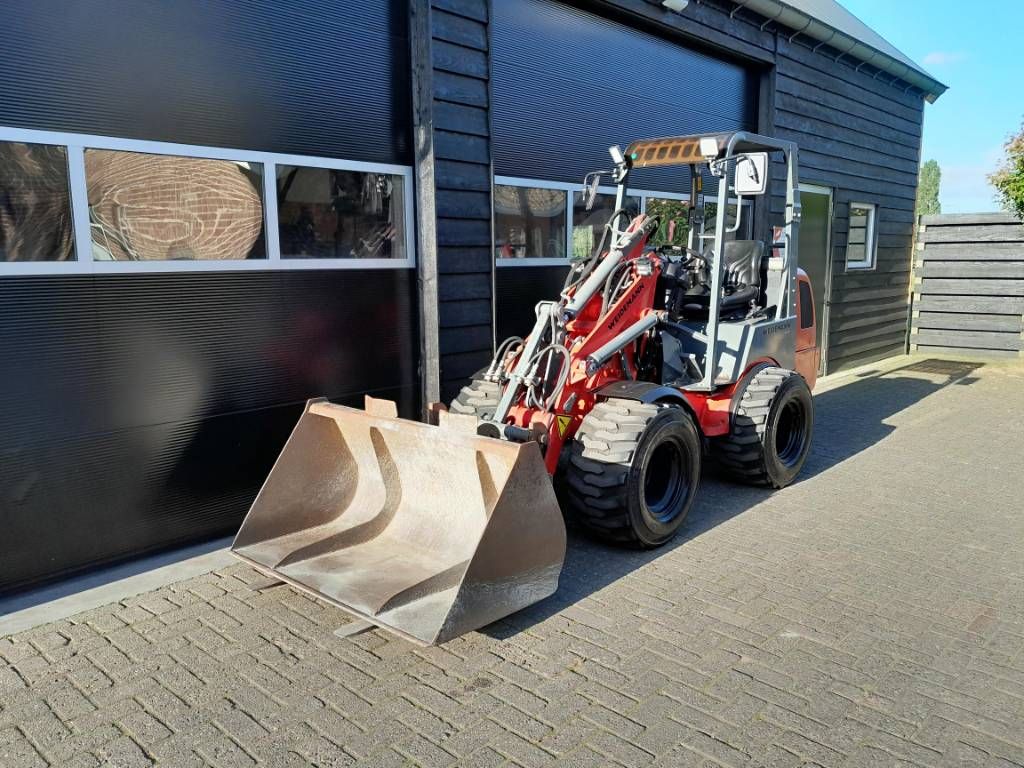 Weidemann 1250 cc 35 minishovel met bak en vorken