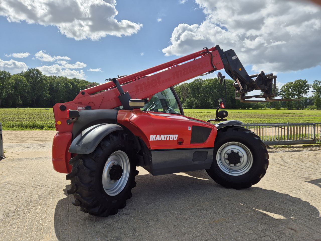 Manitou MRT 2150 + Privilege remote control en Manitou MT 9.32