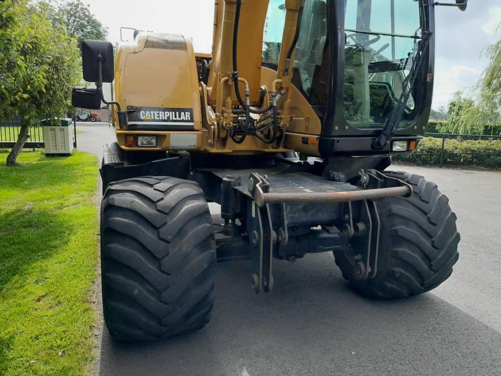 CAT M 313 C - Mobiele Kraan - Graafmachine