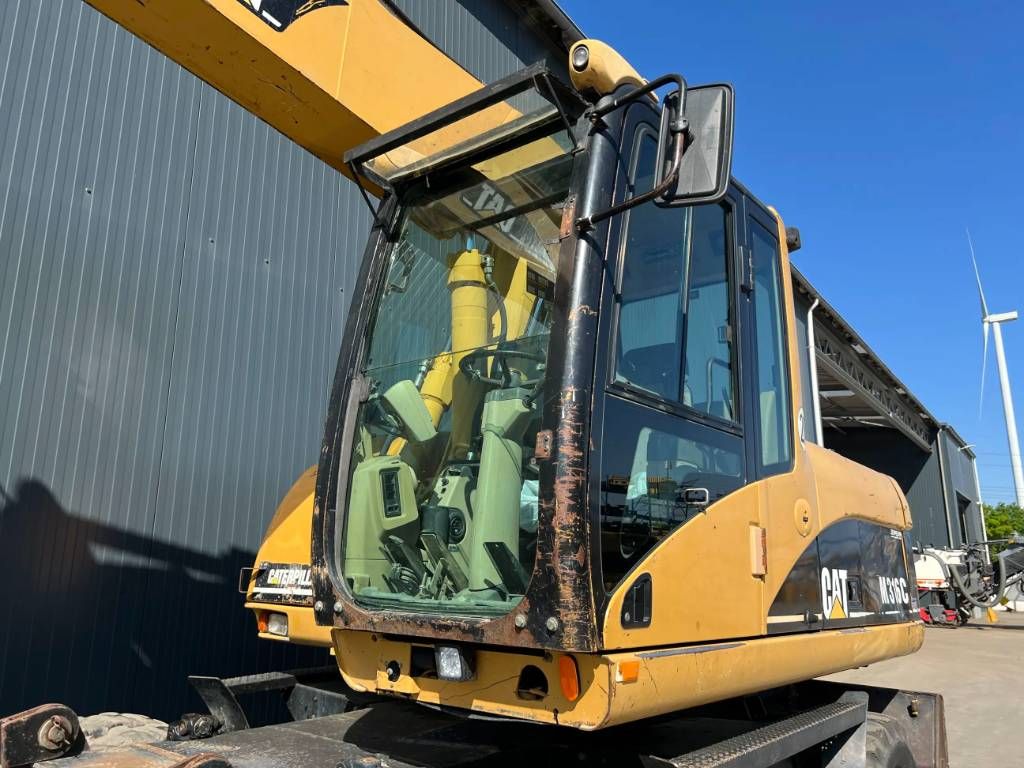 CAT M316C