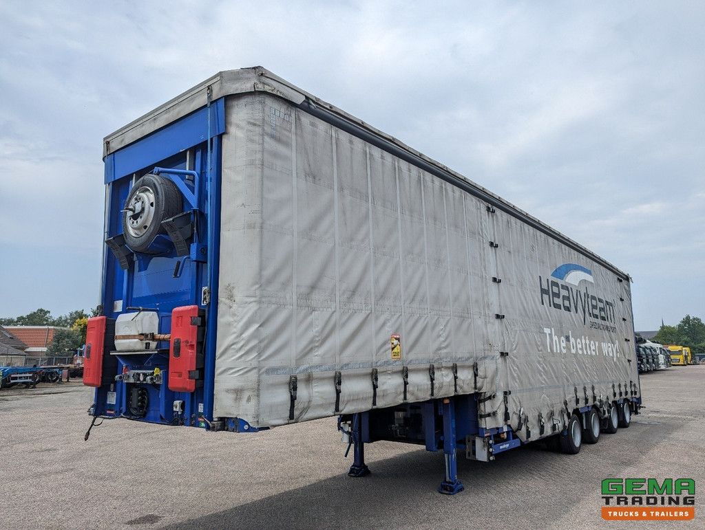 Meusburger MPG-4 Semi Low Loader 3-Axles BPW - Curtain Sider/Sliding roof/Lifting roof/Expandable - Wheel Arches - Boom slot