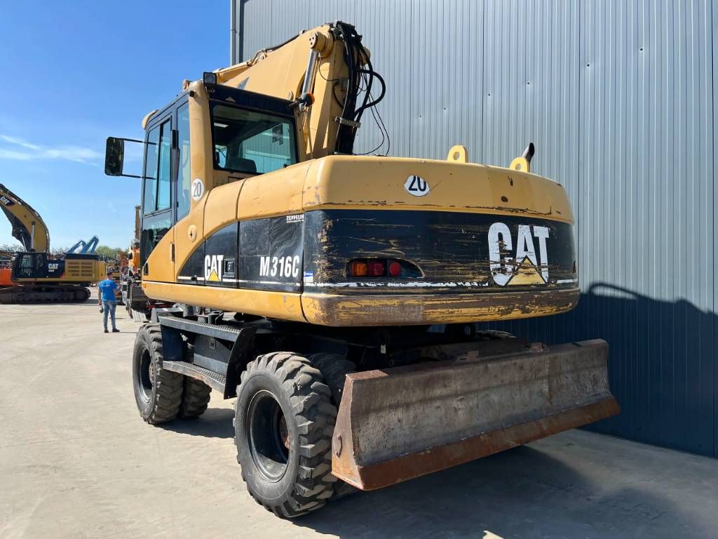 CAT M316C