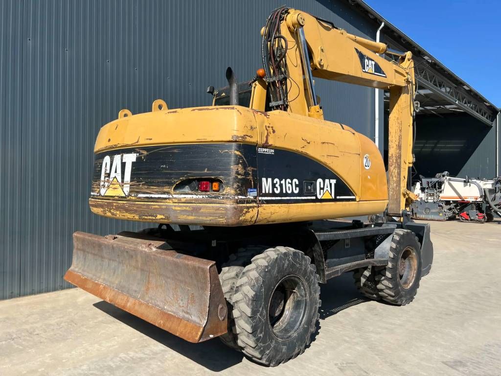 CAT M316C