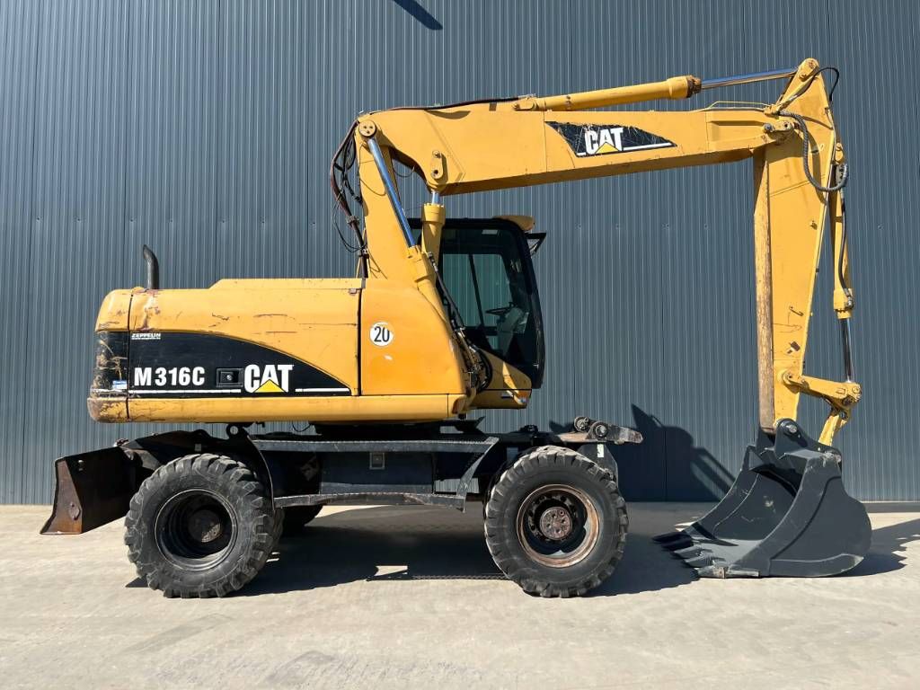 CAT M316C