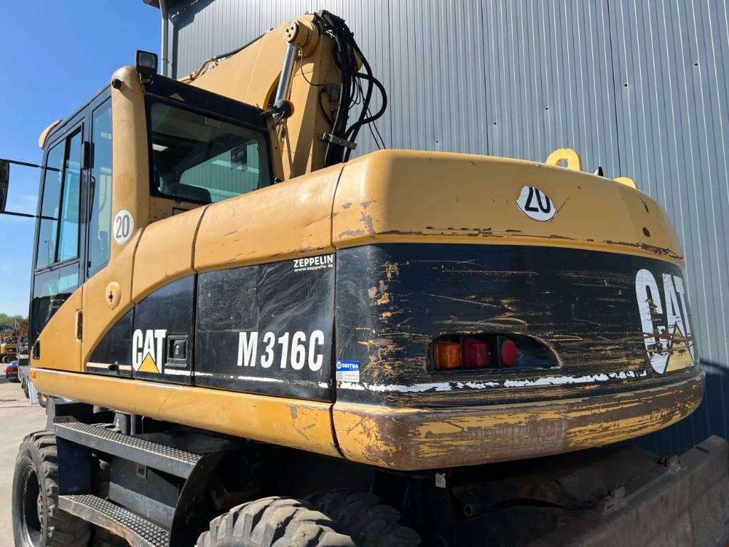 CAT M316C