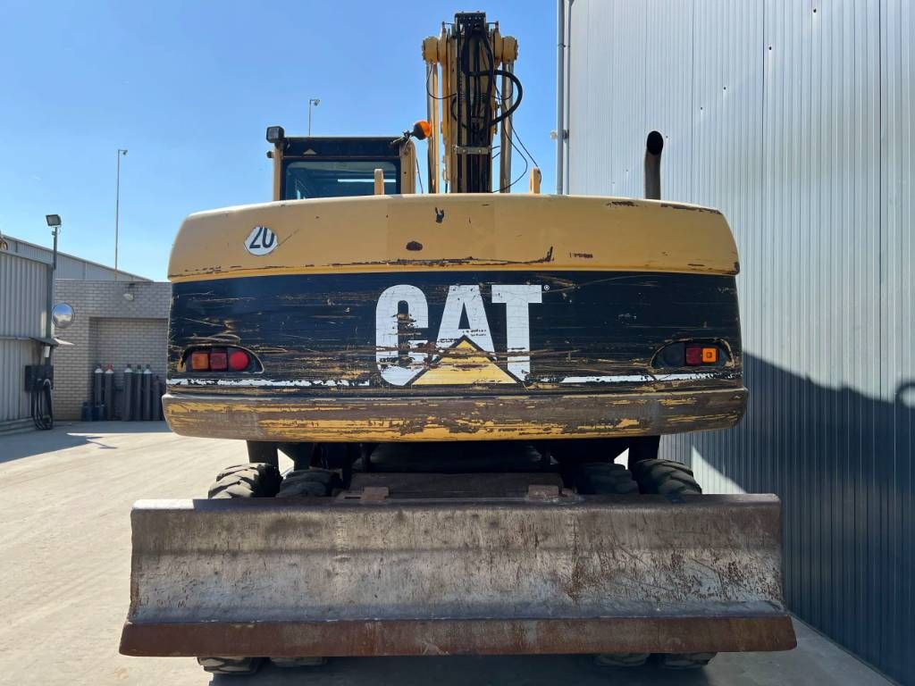 CAT M316C
