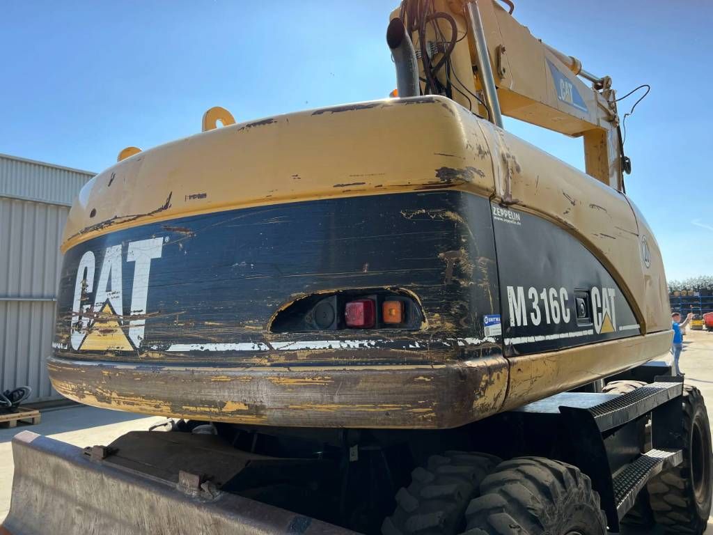 CAT M316C