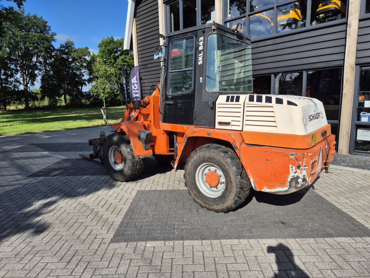 Gebruikte Schaeff SKL843 shovel met cabine