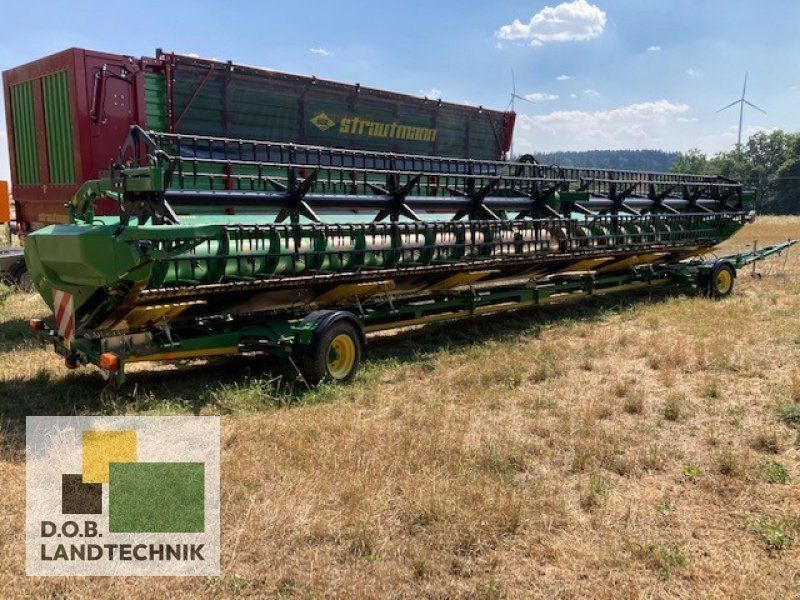 John Deere 640X mit Schneidwerkswagen Schneidwerk