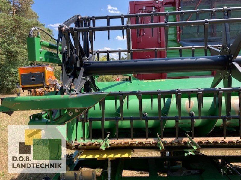 John Deere 640X mit Schneidwerkswagen Schneidwerk