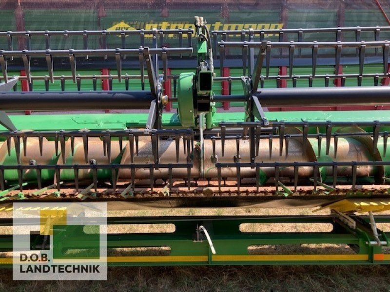 John Deere 640X mit Schneidwerkswagen Schneidwerk