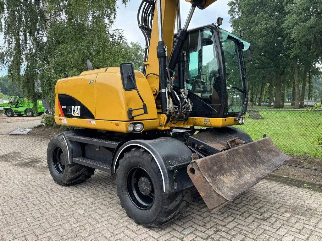 Caterpillar M313D Mobiele kraan draaikantelstuk