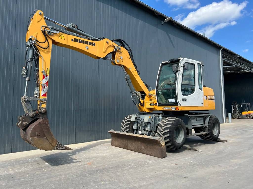 Liebherr A 311 Litronic