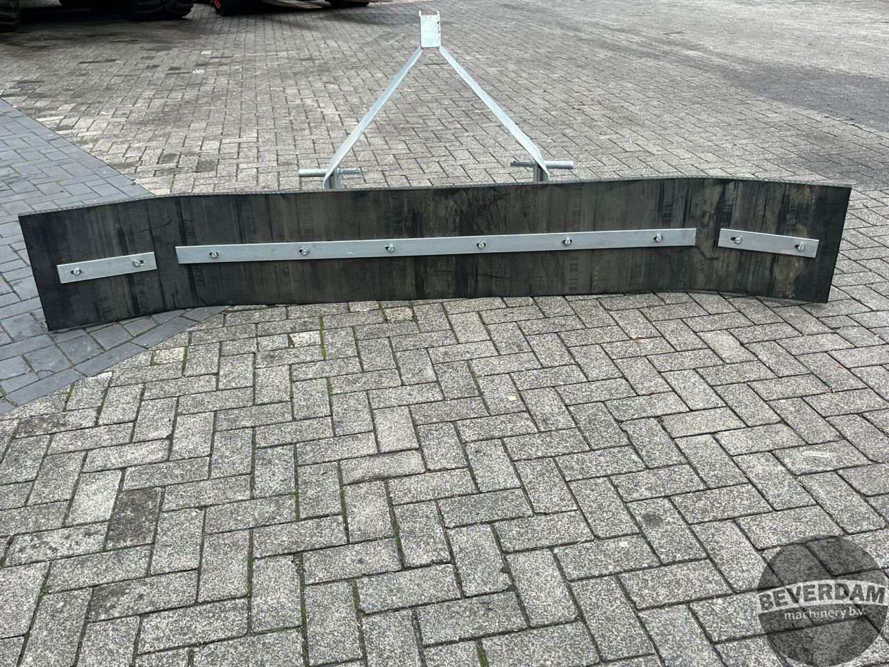 Rubberen schuif met lepelbevestiging