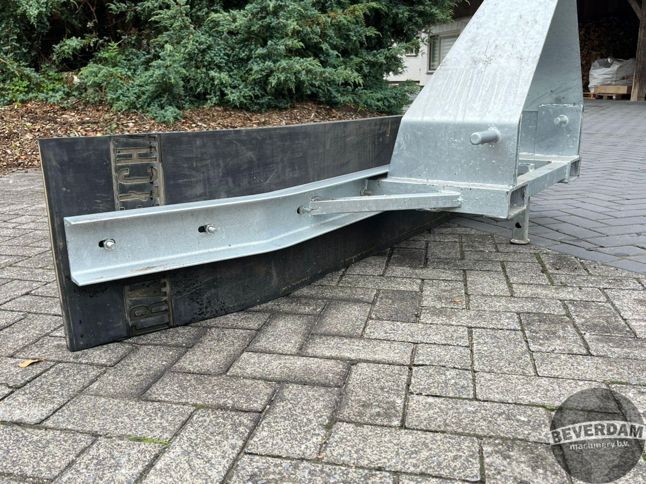 Rubberen schuif met lepelbevestiging