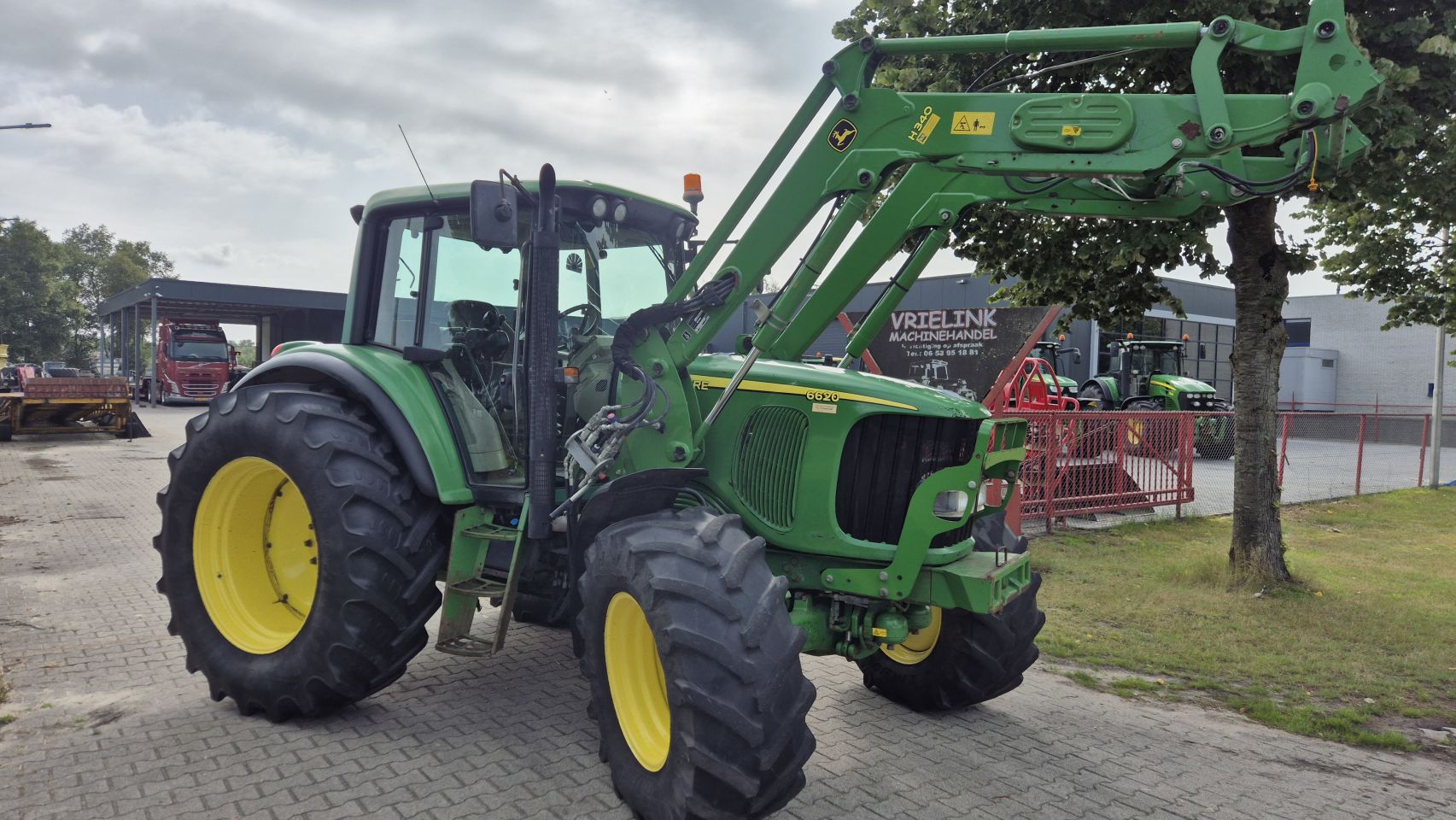 JOHN DEERE 6620 Premium AP 40Km/h. met JD H340 frontlader en TLS
