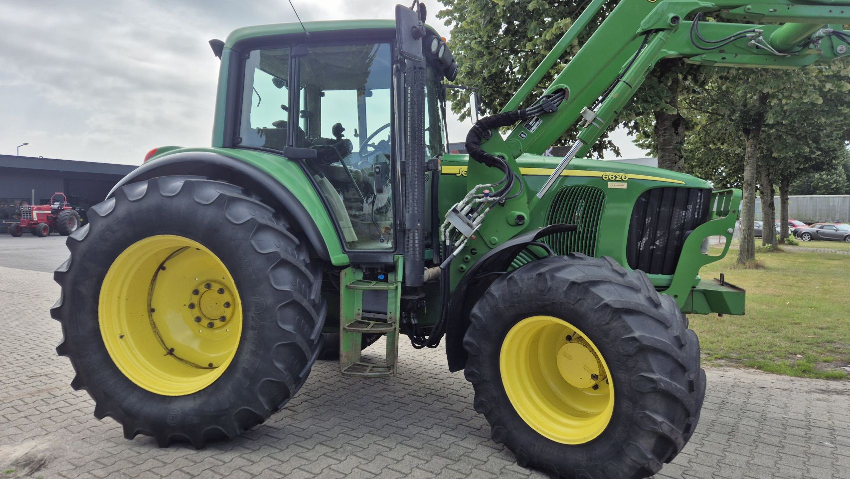 JOHN DEERE 6620 Premium AP 40Km/h. met JD H340 frontlader en TLS