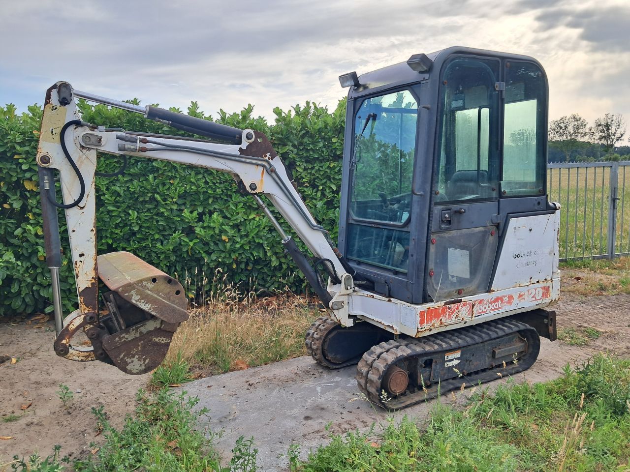 Minigraver Bobcat 320 / Minikraan / Kubota / Graafmachine