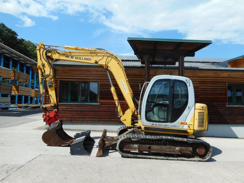 Kobelco NEW HOLLAND E80-1ES mit POWERTILT ( 8.290kg )