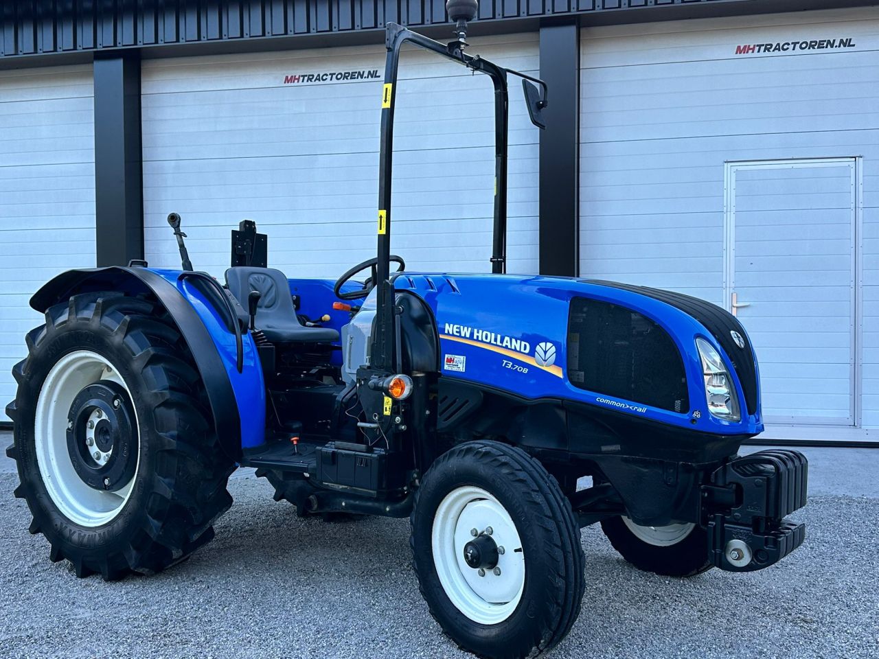 TE KOOP: zo goed als nieuwe NEW HOLLAND T3.70-B
