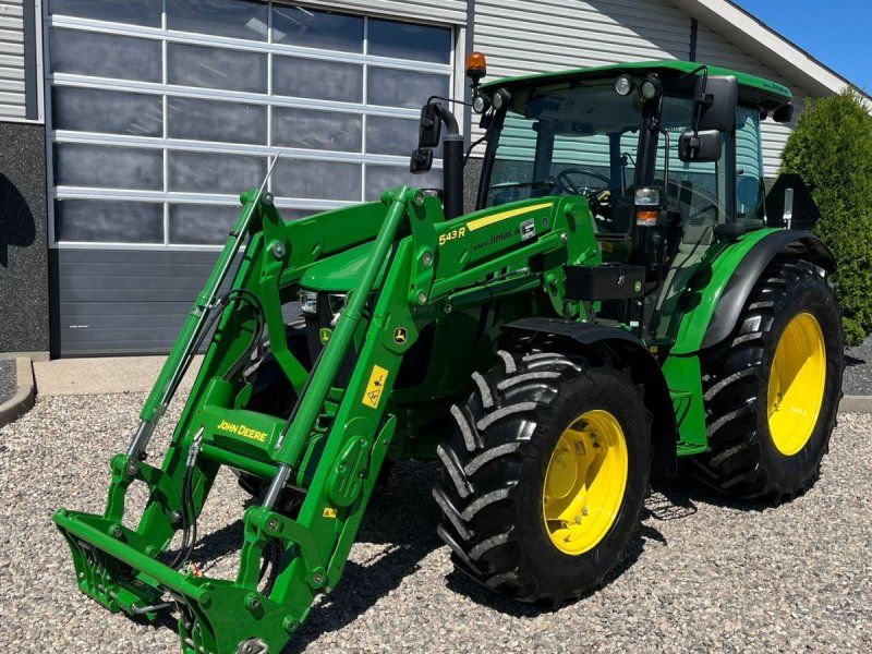 John Deere 5115M Med frontlæsser, som ny