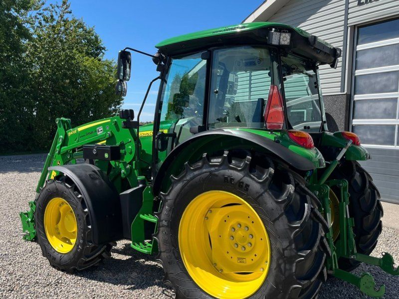 John Deere 5115M Med frontlæsser, som ny