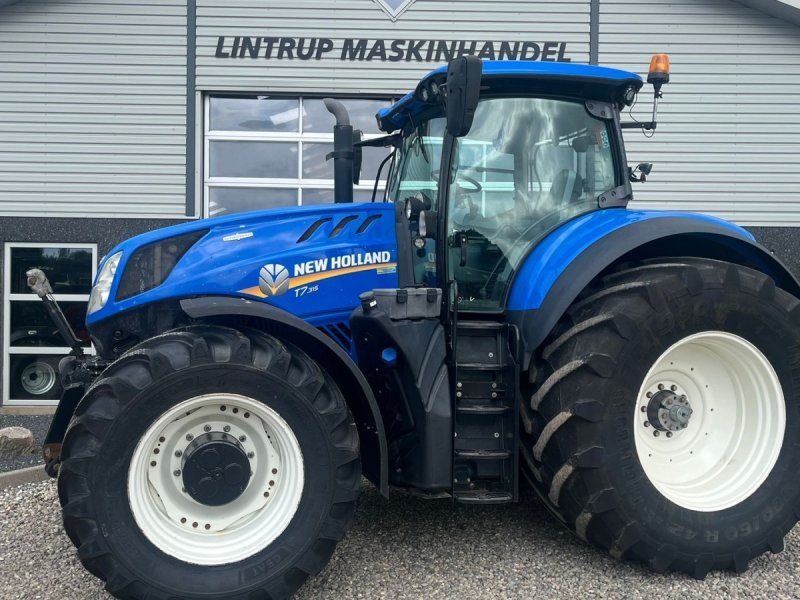 New Holland T7.315 HD med frontlift og front PTO, samt NYE 650mm fordæk og s
