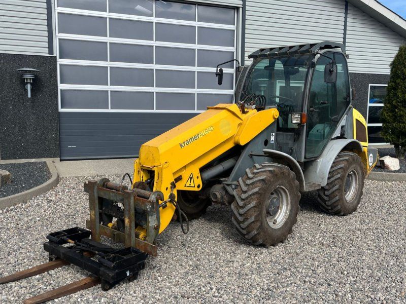 Kramer 750T Allrad med pallegafler og adabter. Med teleskop-arm