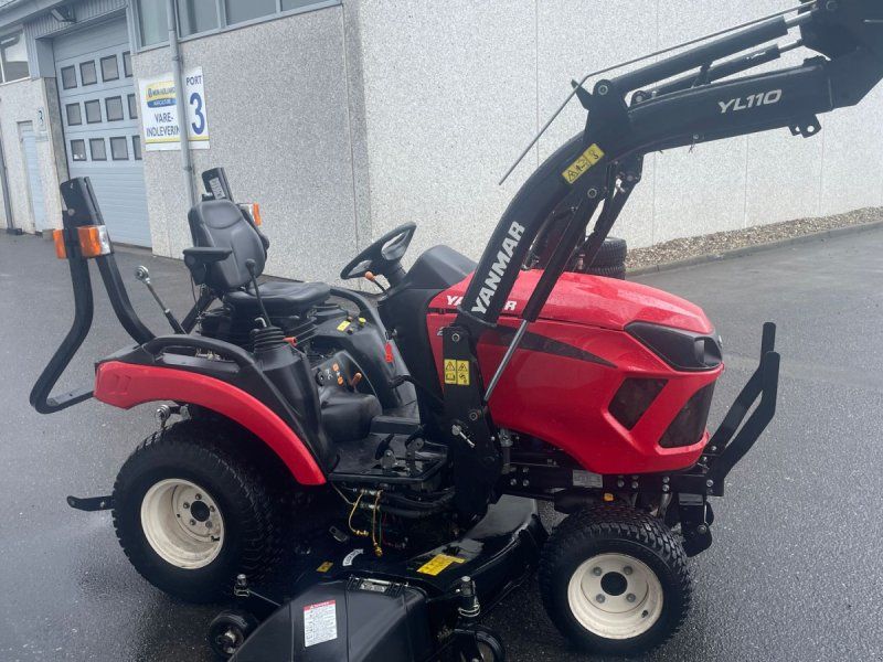 Yanmar SA 221 med klippebord og frontlæsser