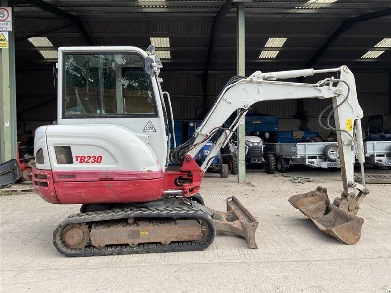 Takeuchi TB230 SOLGT!!! Kun 1330 timer. To skovle. Ring til Ulrik på 4025