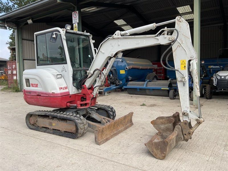 Takeuchi TB230 SOLGT!!! Kun 1330 timer. To skovle. Ring til Ulrik på 4025