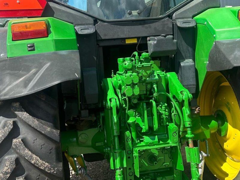 John Deere 6310 Måj fin 6310 med frontlæsser