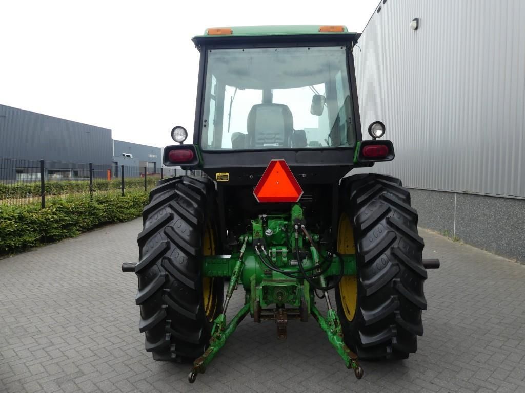 Amerikaanse John Deere 4450 4WD met voorlader