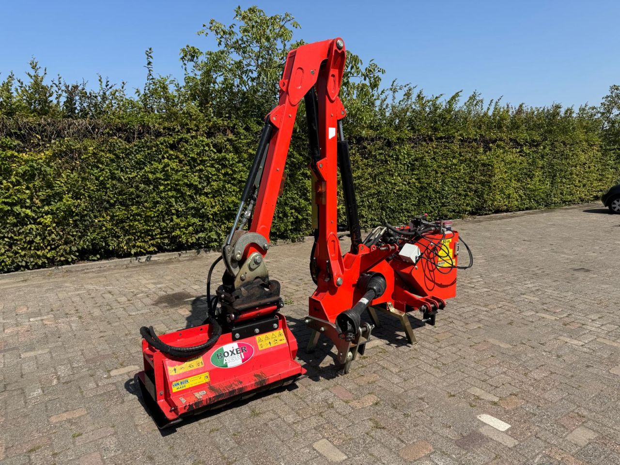 Arm klepelmaaier + heggenschaar