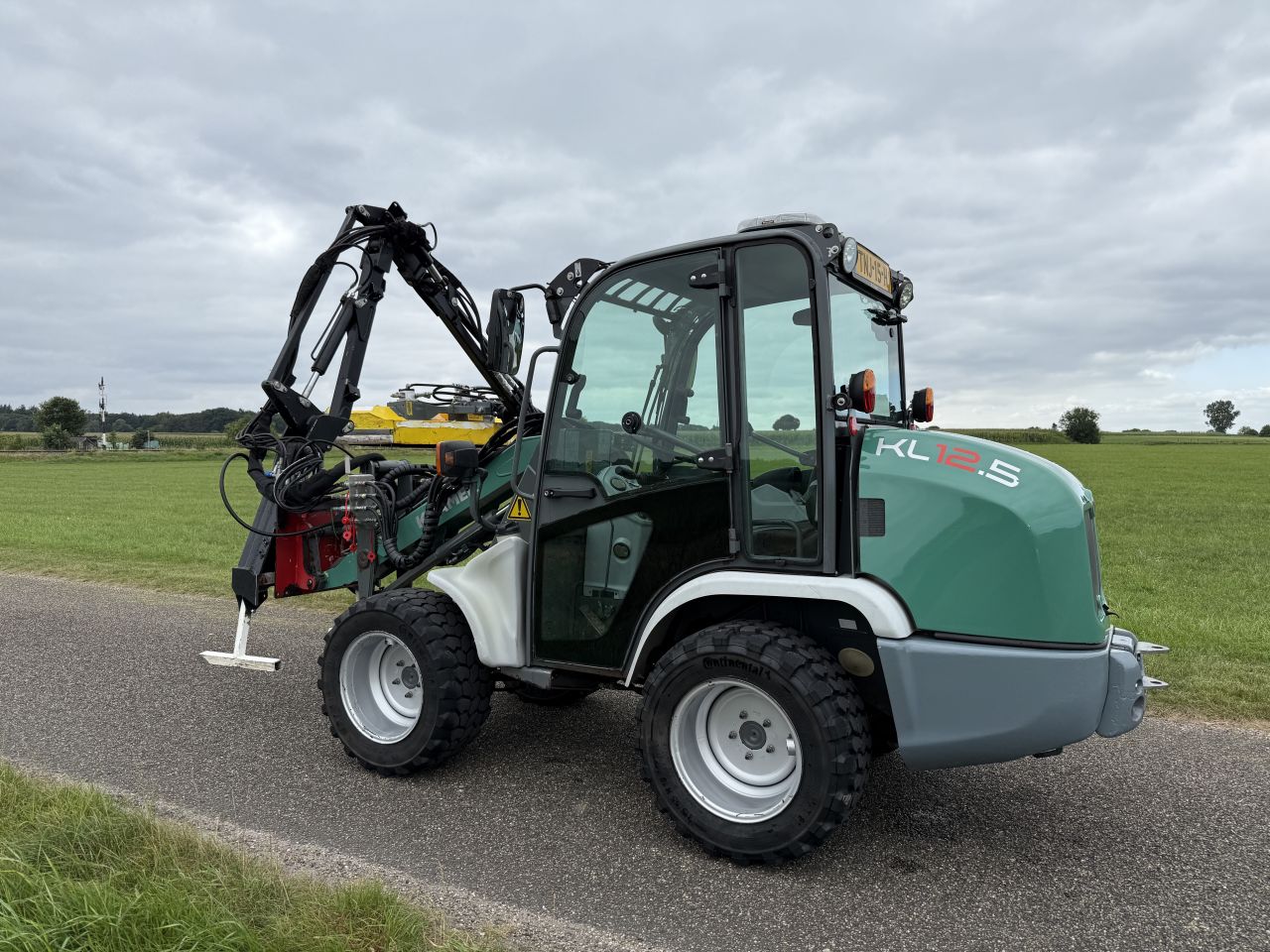 Kramer KL12.5 shovel met maaiarm, MC Connel, Becx snoeidek,