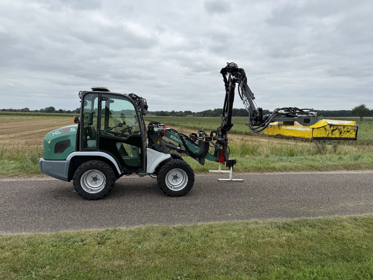 Kramer KL12.5 shovel met maaiarm, MC Connel, Becx snoeidek,