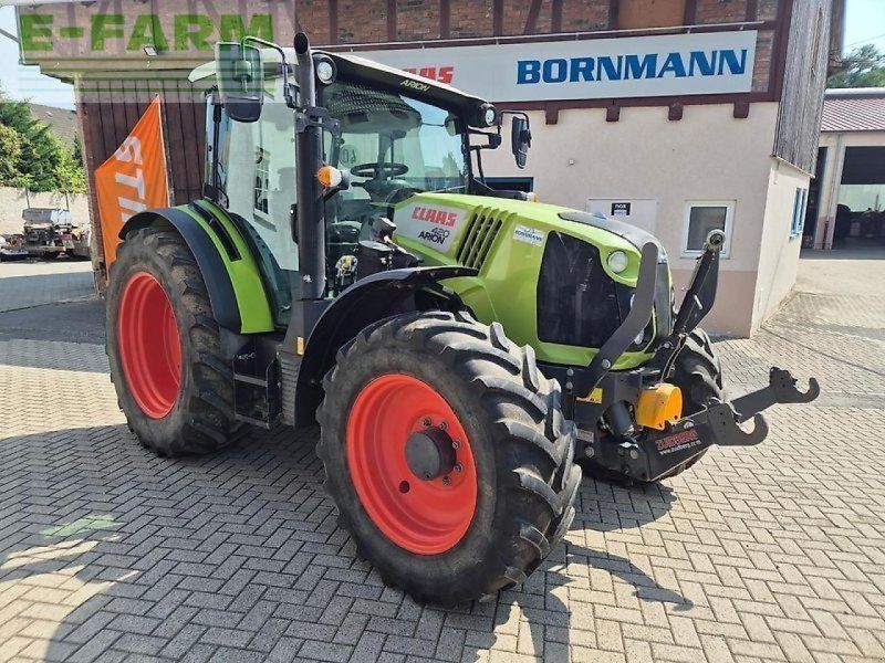 Claas arion 420 mit frontladerkonsolen, fkh und fzw