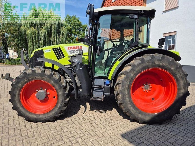 Claas arion 420 mit frontladerkonsolen, fkh und fzw