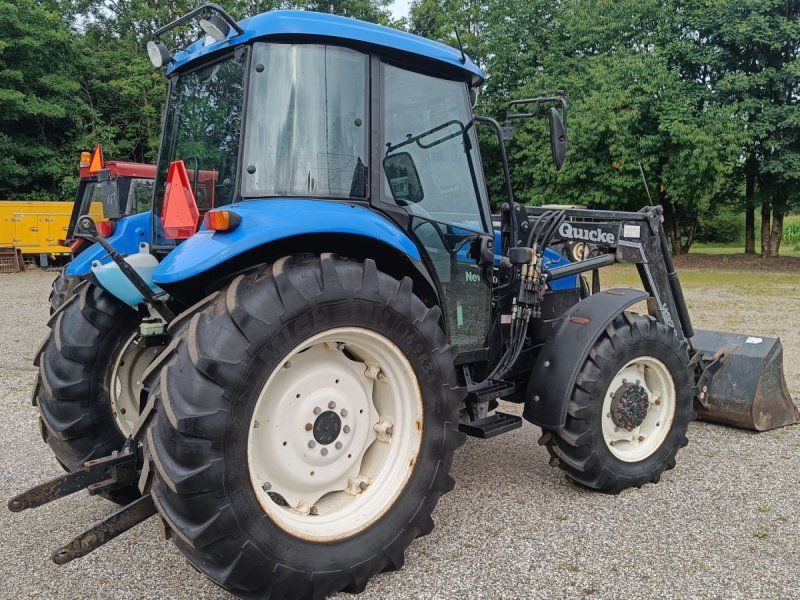 New Holland TD90D med frontlæsser (Eurobeslag)