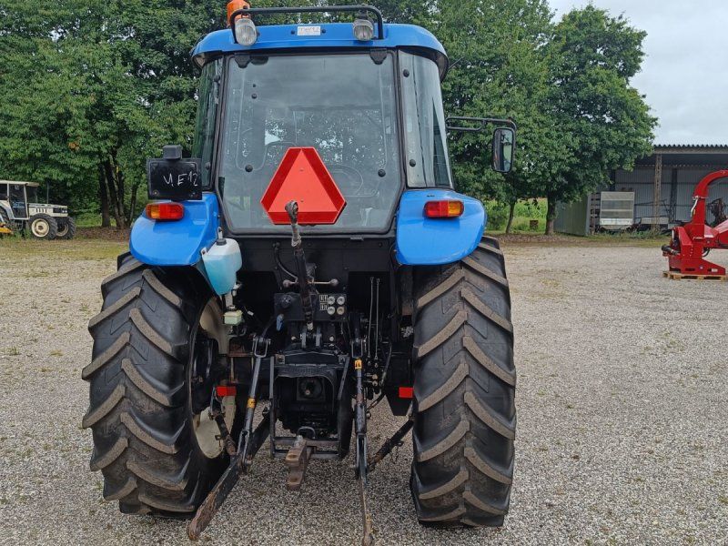 New Holland TD90D med frontlæsser (Eurobeslag)