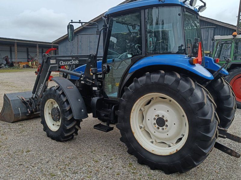 New Holland TD90D med frontlæsser (Eurobeslag)