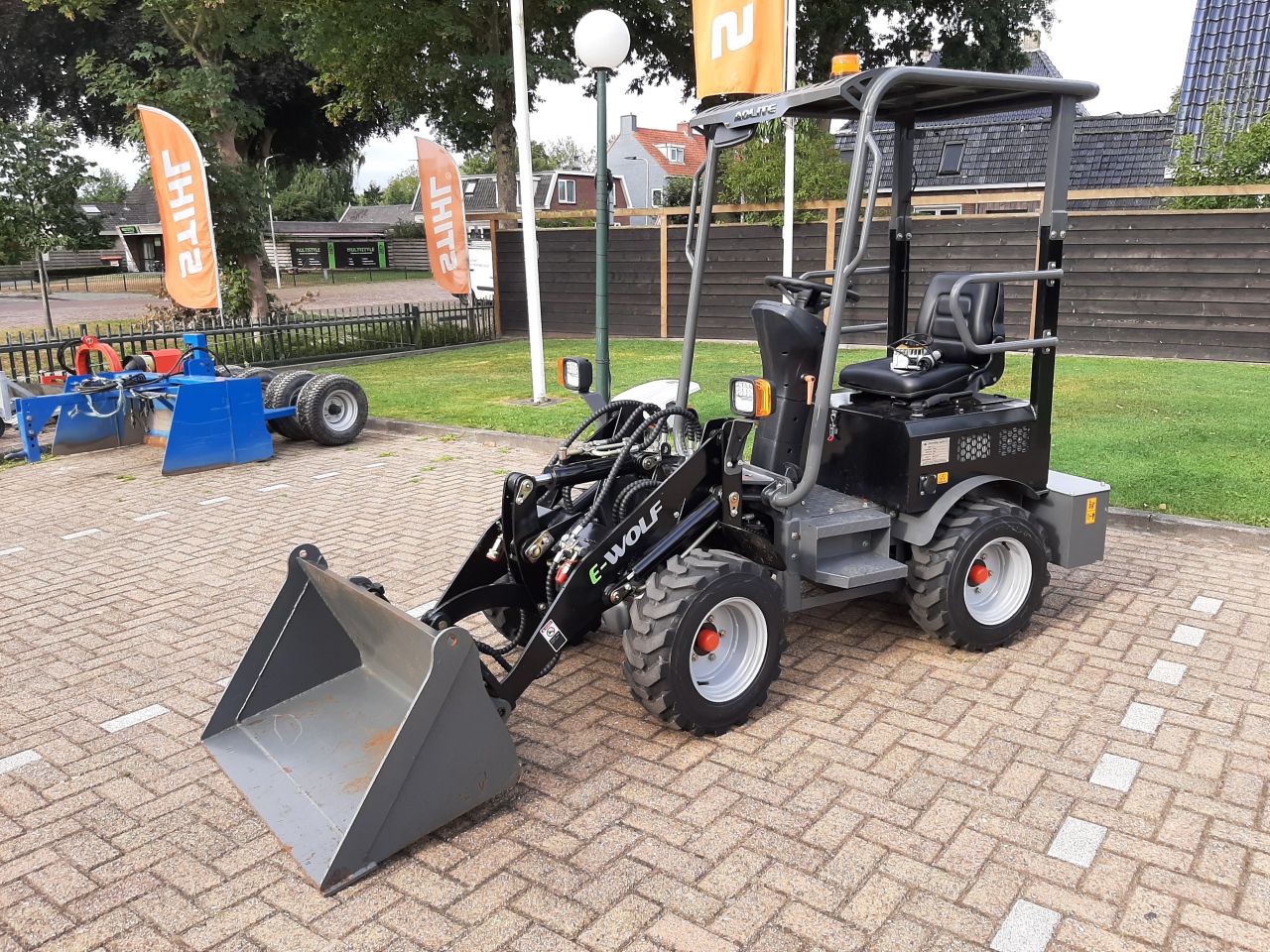 E Wolf 604 elektrische shovel met grondbak