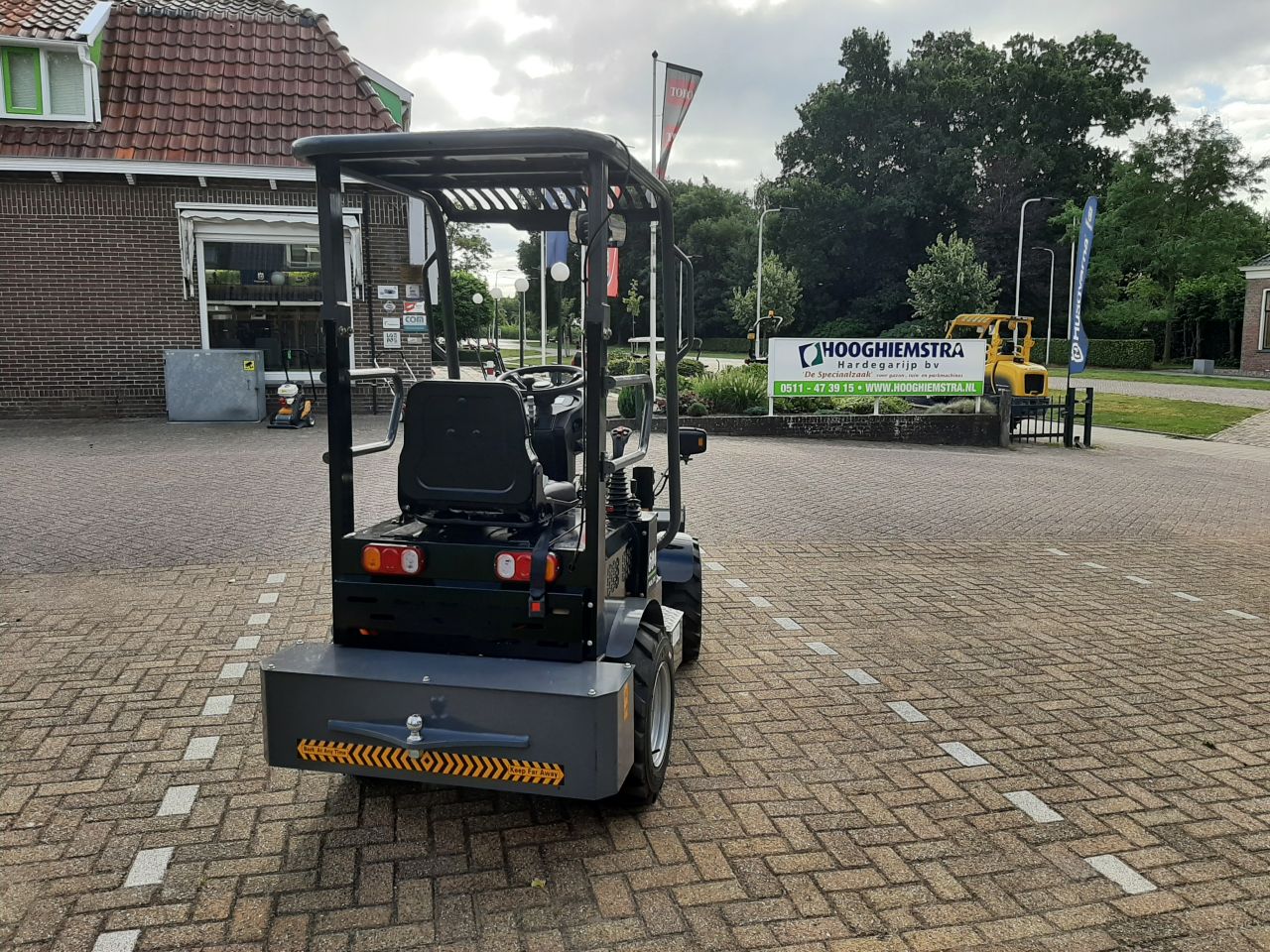 E Wolf 604 elektrische shovel met grondbak