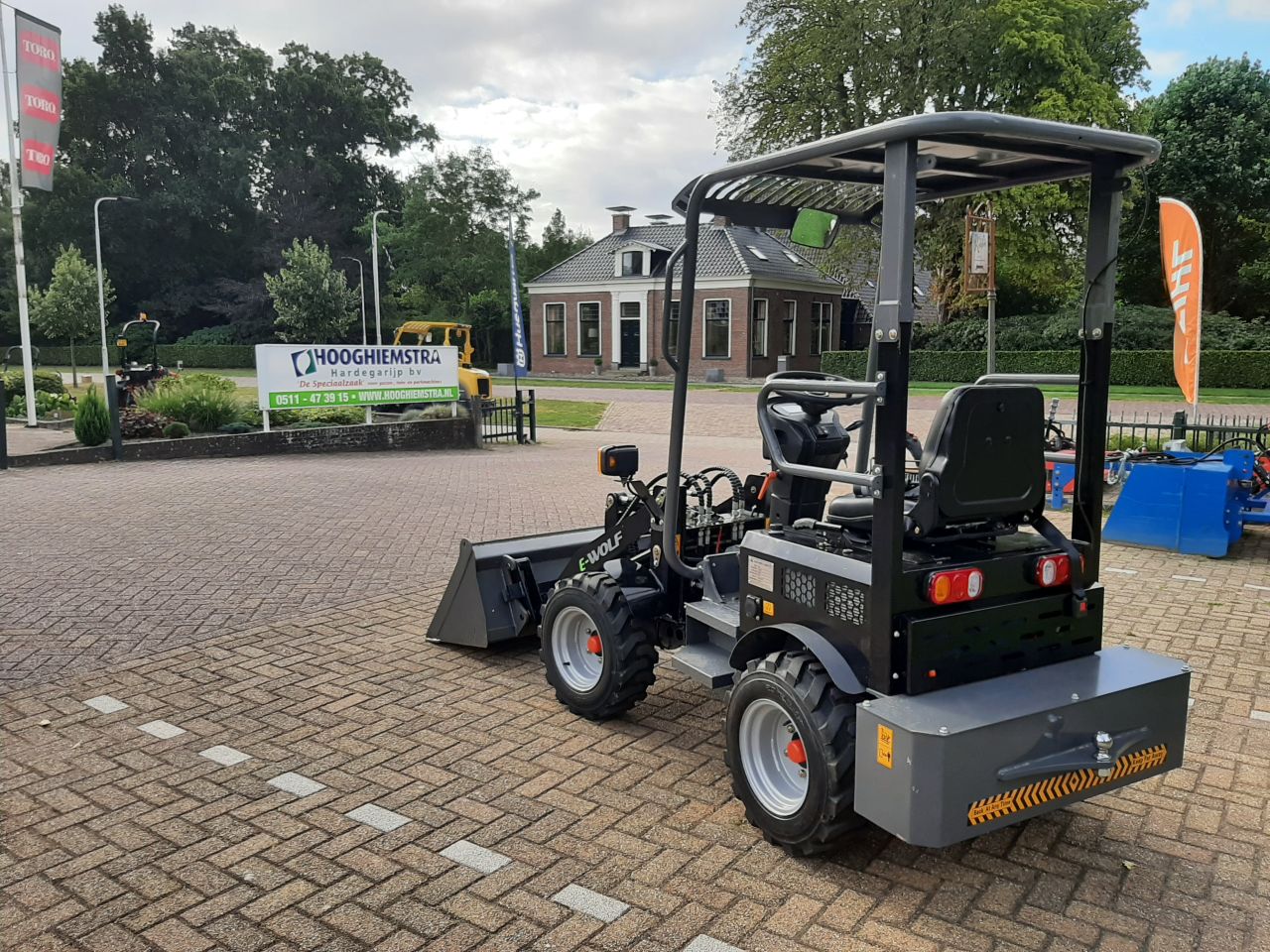 E Wolf 604 elektrische shovel met grondbak